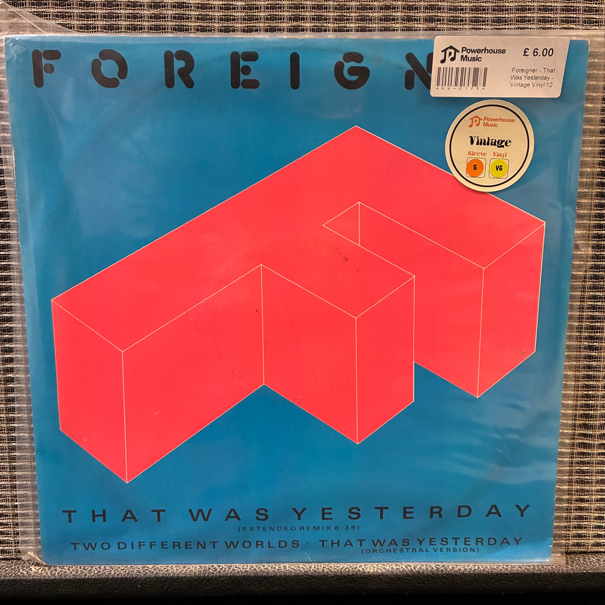 Foreigner Vinyl record cover with geometric design and text on a blue background