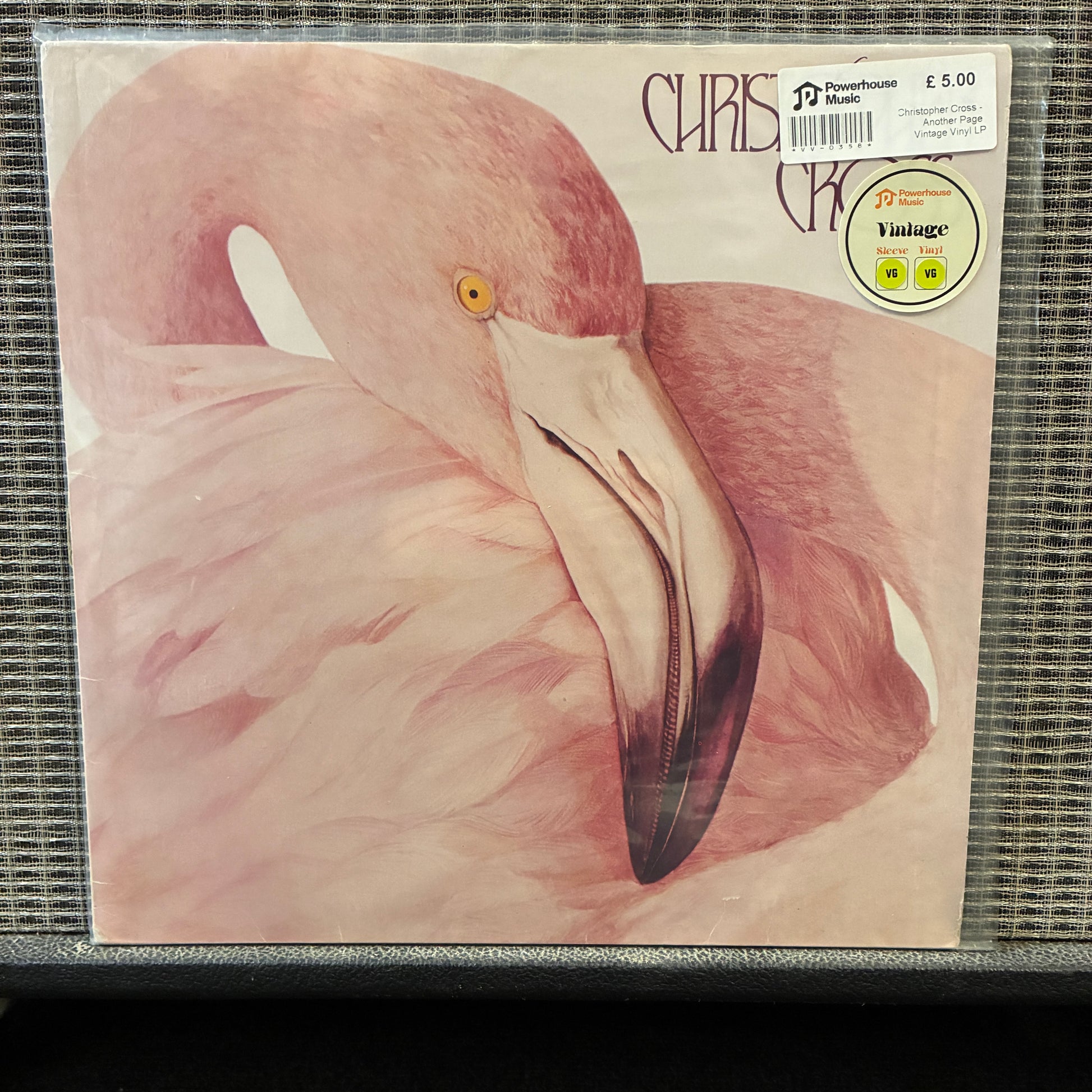 Christopher Cross - Another Page Vinyl record cover with a pink flamingo design and visible label.