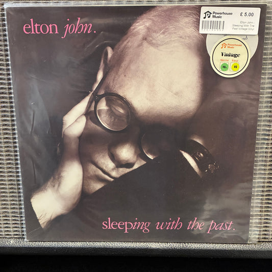Elton John - Sleeping With The Past Vinyl record cover of Elton John's 'Sleeping with the Past' with a black and white photo of Elton John.