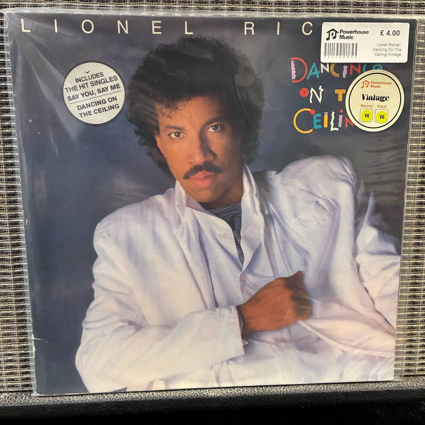 Lionel Richie - Dancing On The Ceiling Vinyl record cover featuring a person with text and branding
