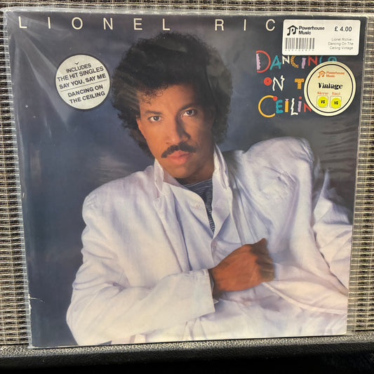 Lionel Richie - Dancing On The Ceiling Vinyl record cover featuring a person with text and branding