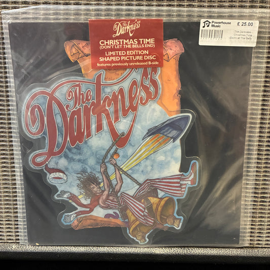 The Darkness - Christmas Time Vinyl record with 'The Darkness' album cover featuring a rocket and colorful design.