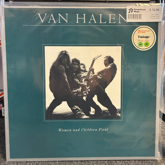 Van Halen - Women And Children First Vintage Vinyl LP Van Halen 'Women and Children First' vinyl record album cover in a clear plastic sleeve, with a teal background and a black-and-white band photo. A Powerhouse Music 'Vintage' sticker is visible in the top right.