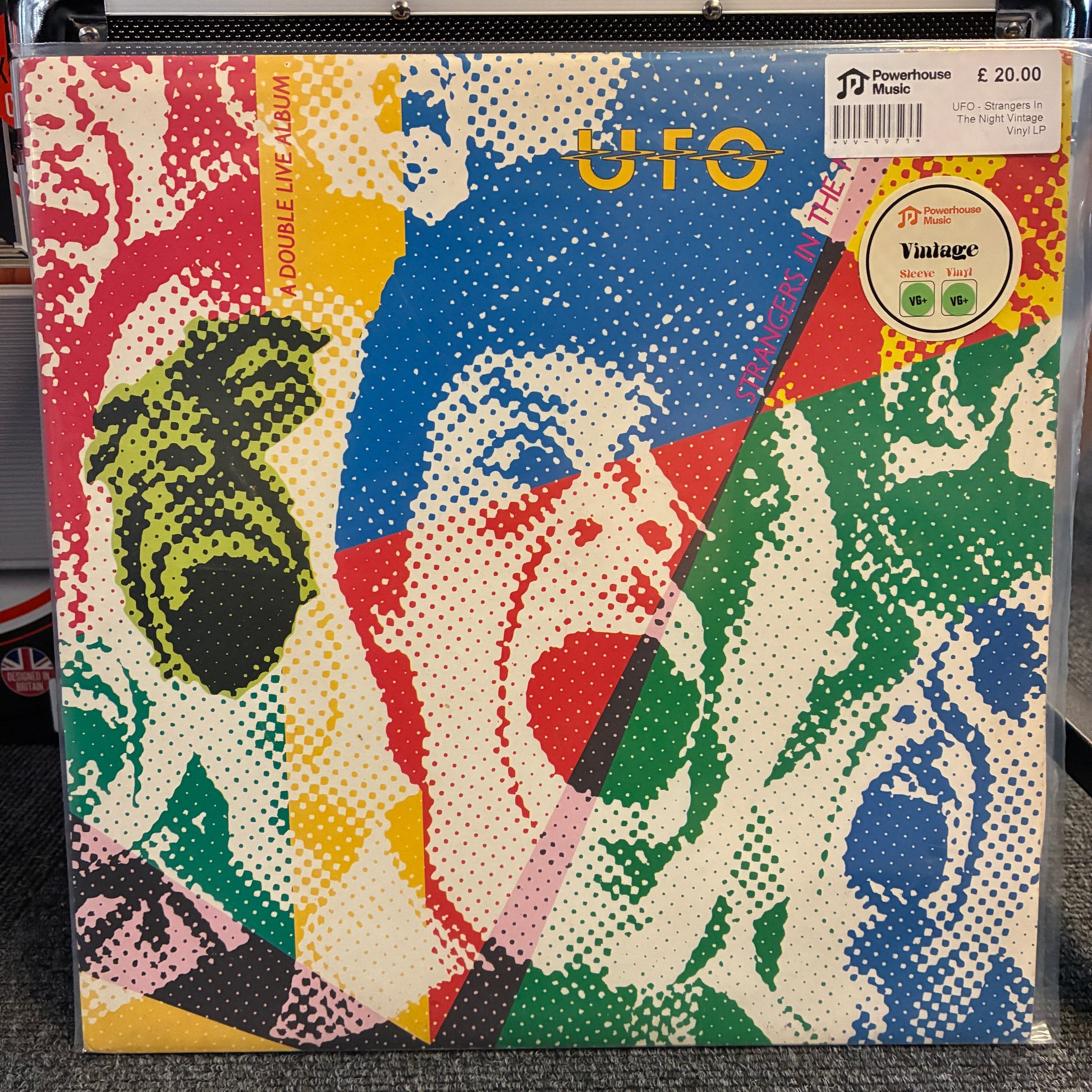 UFO - Strangers In The Night Vintage Vinyl LP A vinyl record sleeve for 'Double Live Album' by UFO, featuring a vibrant halftone pop-art collage of faces in red, blue, green, yellow, and cream. A Tower Records 'Vintage' 19-inch vinyl sticker is visible in the top right corner.