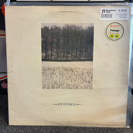 Joy Division - Shes Lost Control / Atmosphere Vintage Vinyl 12" Single Vintage Joy Division 'Parachute' vinyl record sleeve in cream-colored paper, featuring a black and white forest photograph. Includes a 'Vintage' sticker and a 'JD Music' barcode sticker.