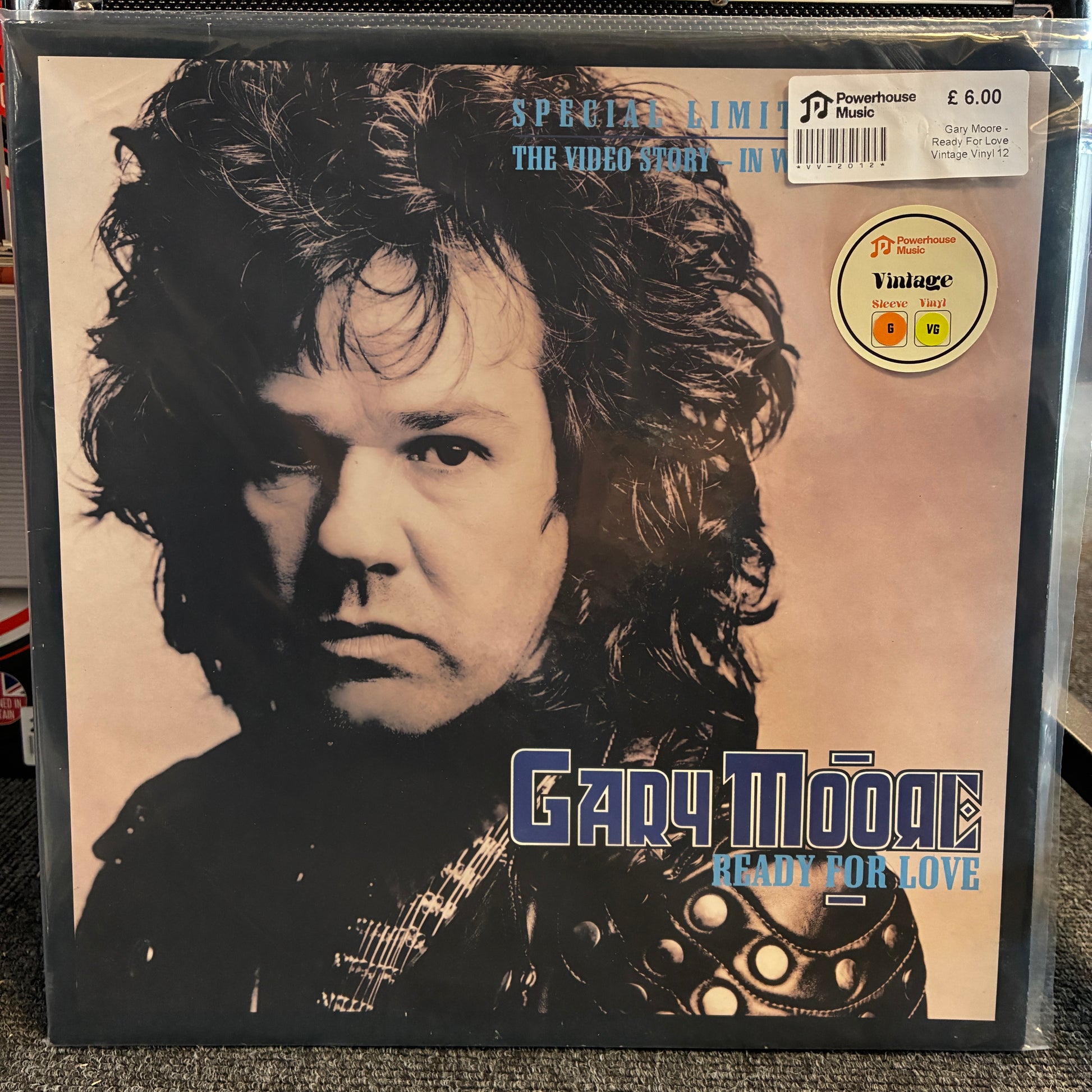 Gary Moore - Ready For Love Vintage Vinyl 12" Single A vinyl record sleeve for Gary Moore's 'Ready For Love' in a clear plastic protective case. The cover features a close-up portrait of Gary Moore with blue and white text, and a Powerhouse logo sticker is visible in the top right.