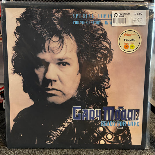 Gary Moore - Ready For Love Vintage Vinyl 12" Single A vinyl record sleeve for Gary Moore's 'Ready For Love' in a clear plastic protective case. The cover features a close-up portrait of Gary Moore with blue and white text, and a Powerhouse logo sticker is visible in the top right.