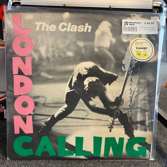 The Clash - London Calling Vintage Vinyl LP The Clash - London Calling vinyl record album in a clear plastic protective sleeve, with a Price Tag sticker in the top right corner.