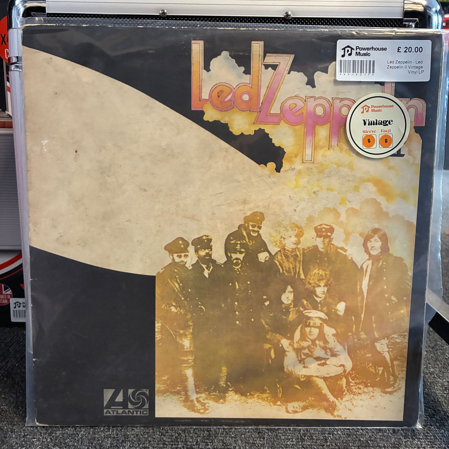 Led Zeppelin - Led Zeppelin II Vintage Vinyl LP Led Zeppelin 'Rumours' vinyl record sleeve in a clear protective plastic case, with a visible 'Vintage' sticker and a 'Powerhouse Records' price label.