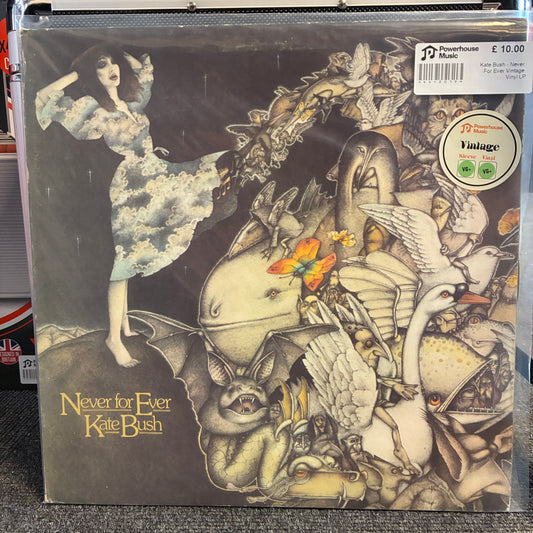 Kate Bush - Never For Ever Vintage Vinyl LP Kate Bush - 'Never for Ever' vinyl record sleeve in a clear plastic protective case, showing illustrated artwork with a woman in a flowing dress and various birds and creatures, plus a Powerhouse Music sticker and a Vintage record label sticker.