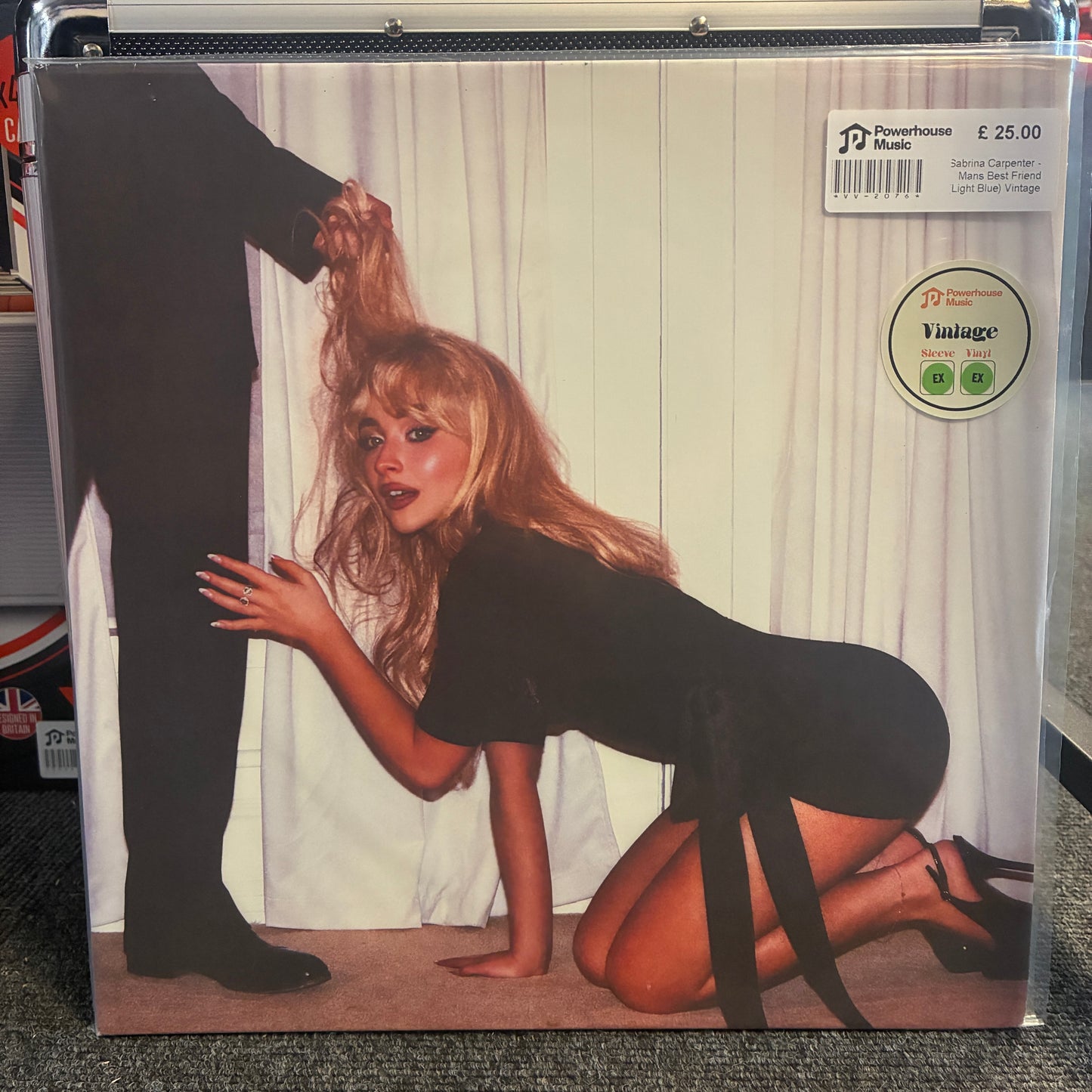Sabrina Carpenter - Mans Best Friend (Light Blue) Vintage Vinyl LP A vinyl record sleeve for Madonna's 'Like a Girl' in the Vintage reissue edition, sealed in a clear plastic protective case. The cover art features Madonna kneeling in a black dress with her hair being held up by a man's hand.