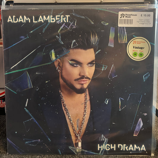 Adam Lambert - High Drama (Clear) Vintage Vinyl LP Adam Lambert 'High Drama' vinyl record album cover, showing a portrait of the artist behind shattered glass with a visible Powerhouse Studio sticker and a Vintage label.