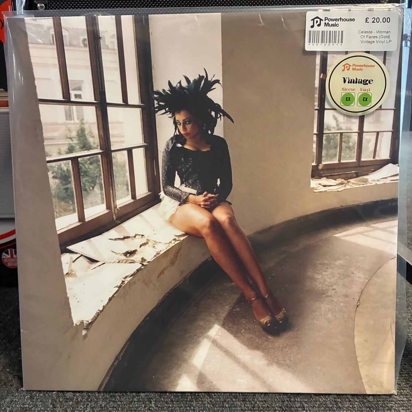 Celeste - Woman Of Faces (Gold) Vintage Vinyl LP A vinyl record sleeve for J-pop musician Naoto Fukasaku's 'Vintage' album, sealed in its original plastic shrink wrap. The cover art features a woman with dark hair sitting on a curved window ledge.