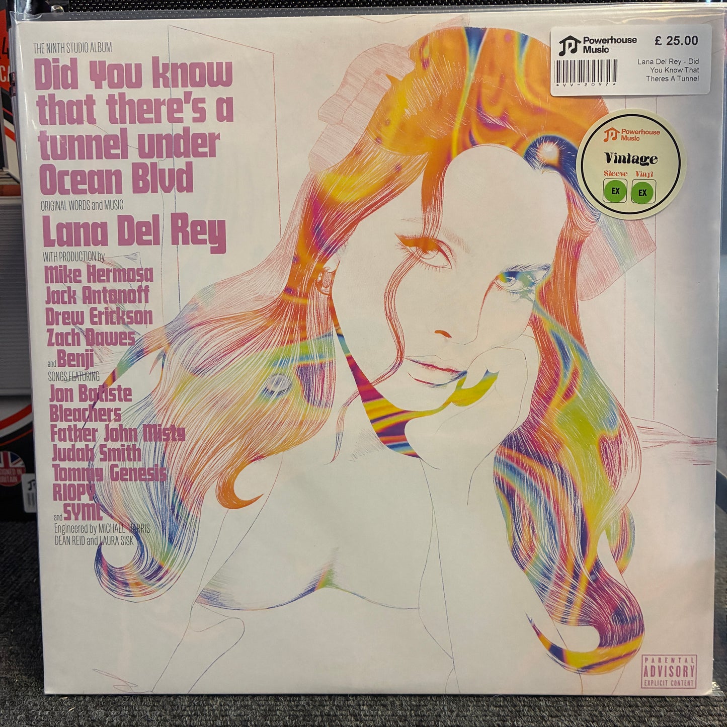Lana Del Rey - Did You Know That Theres A Tunnel Under Ocean Blvd (Limited Edition Orange Translucent Festival Edition) Lana Del Rey 'Did You Know That There's A Tunnel Under Ocean Blvd' vinyl record album cover, featuring a colorful abstract portrait illustration on a white background with tracklist text on the left and a Downhouse Music Vintage label sticker.