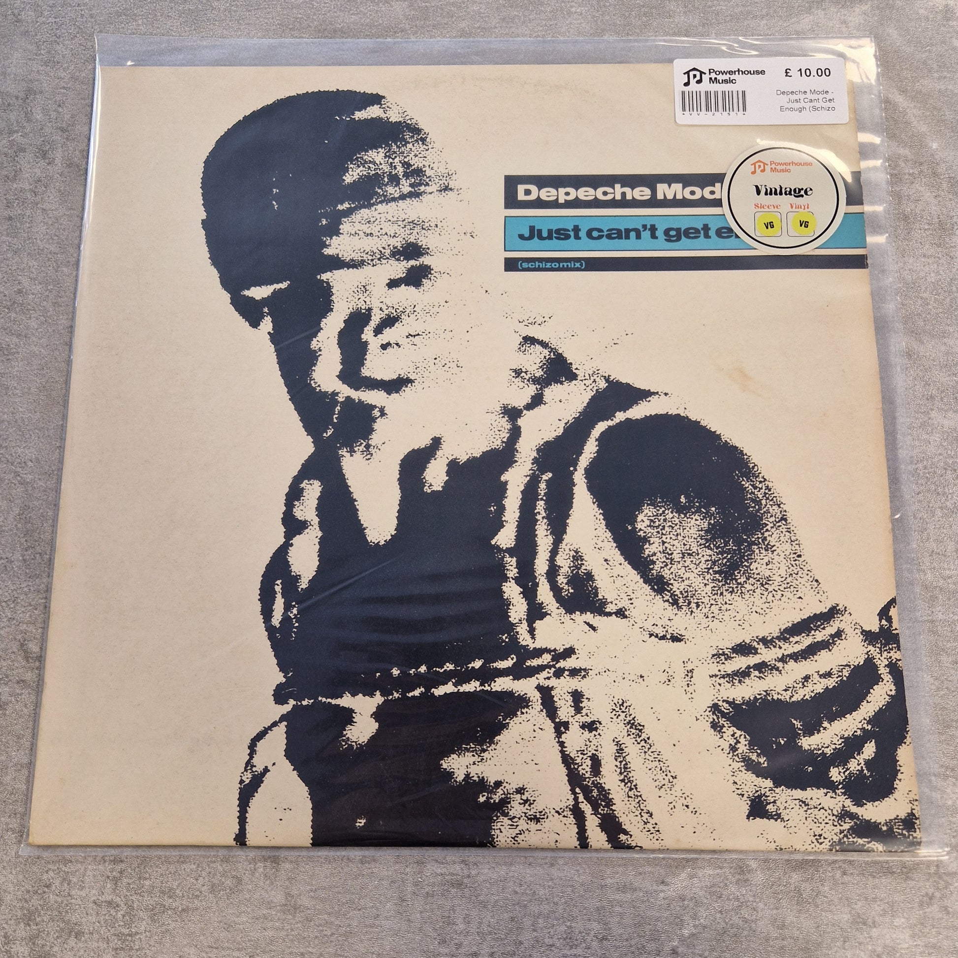 Depeche Mode - Just Cant Get Enough (Schizo Mix) Vintage Vinyl 12" Single A Depeche Mode vinyl record sleeve for the single 'Just can't get it' in the UK, sealed in a clear plastic protective sleeve. The sleeve features a high-contrast black-and-cream graphic portrait of the band members, with the band's name and single details printed on the left side.