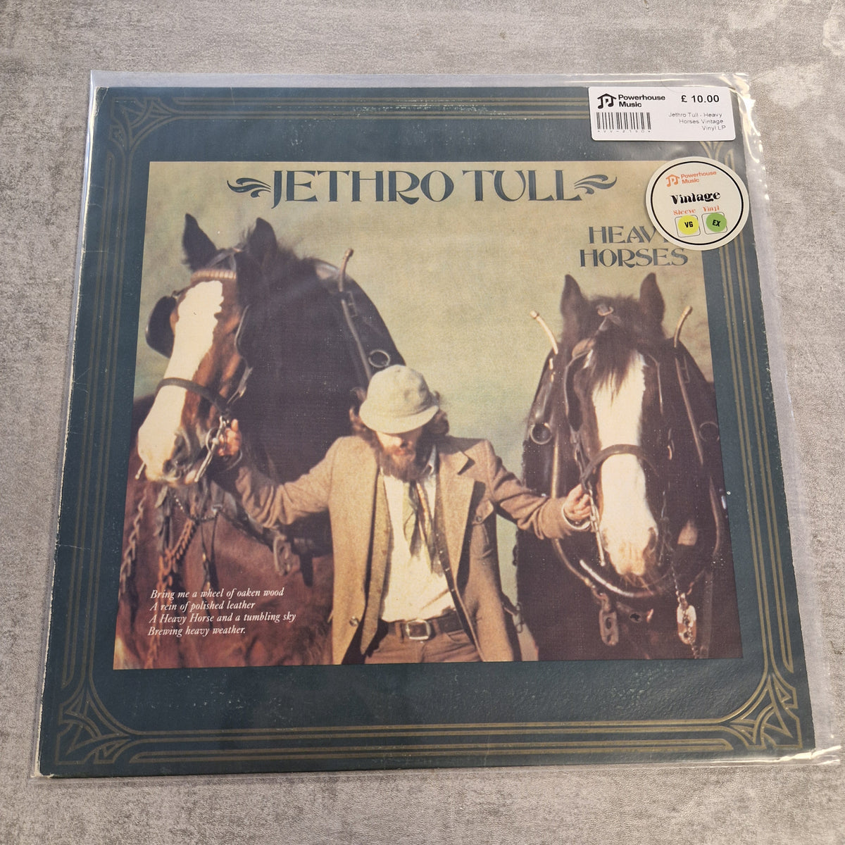 Jethro Tull - Heavy Horses Vintage Vinyl LP Jethro Toll - 'Heard Horses' vinyl record album, sealed in plastic with a visible DGP record label sticker and a Yaglios sticker on a gray textured surface.