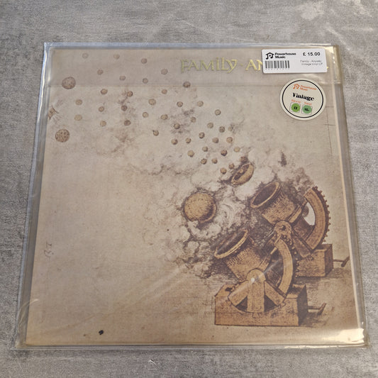 Family - Anyway Vintage Vinyl LP A vinyl record sleeve for Family Animal's album 'Anatomical' on the Vinted platform, still sealed in its original plastic shrink-wrap. The cover art features a sepia-toned vintage illustration of a mechanical gear system on the right and a pattern of small dots on the left, all on a textured beige background.