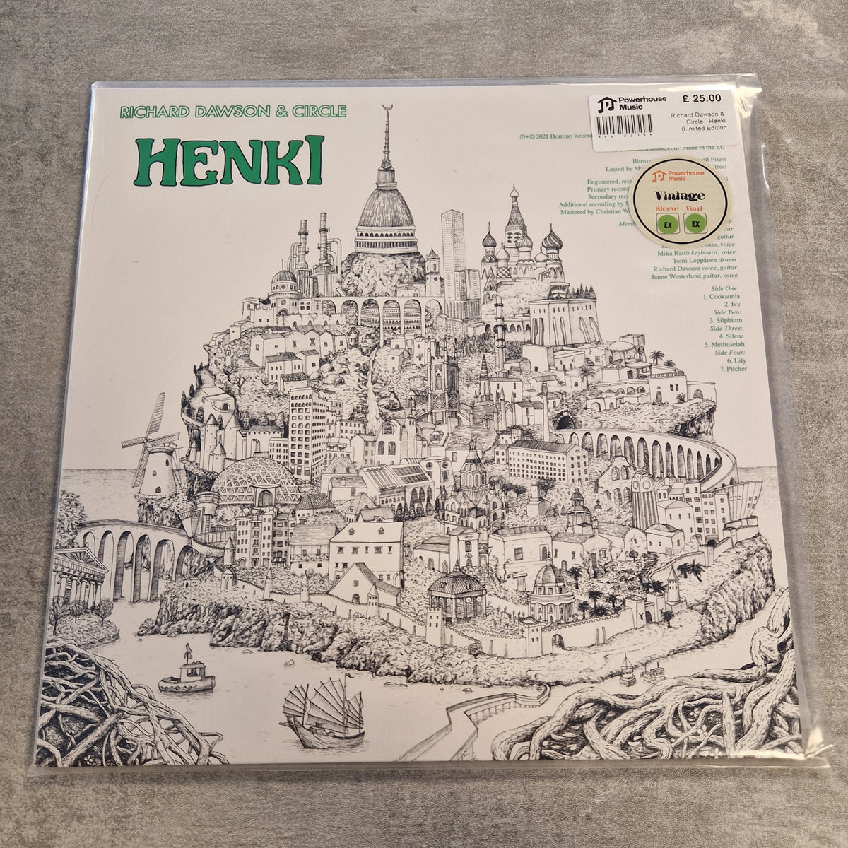 Richard Dawson & Circle - Henki (Limited Edition Light Green) Vintage Vinyl LP Richard Dawson & Circle's Henki 20th Anniversary vinyl record sleeve, sealed in its original plastic shrink-wrap, displayed on a gray textured surface.