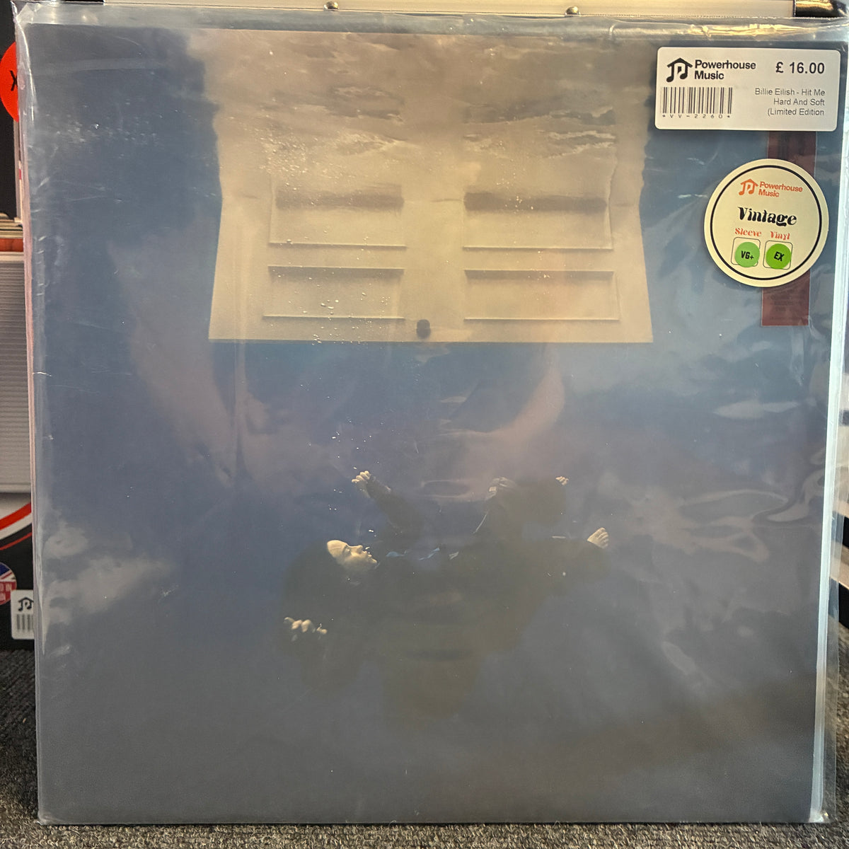 Billie Eilish - Hit Me Hard And Soft (Limited Edition Yellow) Vintage Vinyl LP A vinyl record sleeve for Powerhouse Music's 'Blue Moon' (Single Cover, 12" Single Disc) showing a blue-toned cover with a white vent graphic and stickers, sealed in protective plastic.