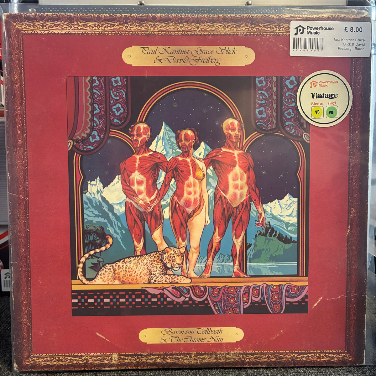 Paul Kantner, Grace Slick & David Freiberg - Baron Von Tollbooth & The Chrome Nun Vintage Vinyl LP A vinyl record sleeve for 'Sacred Callings & Celestial Nova' by Paul Kerting Space Stick & North Star, featuring a red border and an illustration of three anatomical figures with mountains and a leopard in the background. A 'Powerhouse Music' sticker and a 'Vinyl Age' sticker are visible on the top right.