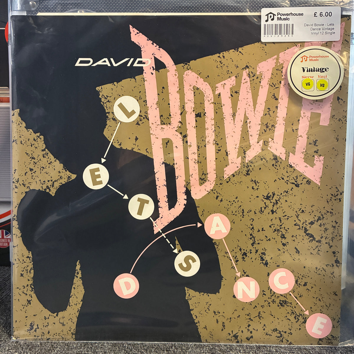David Bowie - Lets Dance Vintage Vinyl 12" Single David Bowie 'Let's Dance' vinyl record sleeve, showing the iconic black silhouette against a textured gold background with pink distressed lettering. A 'JD Vintage Music' sticker is visible in the top right corner.
