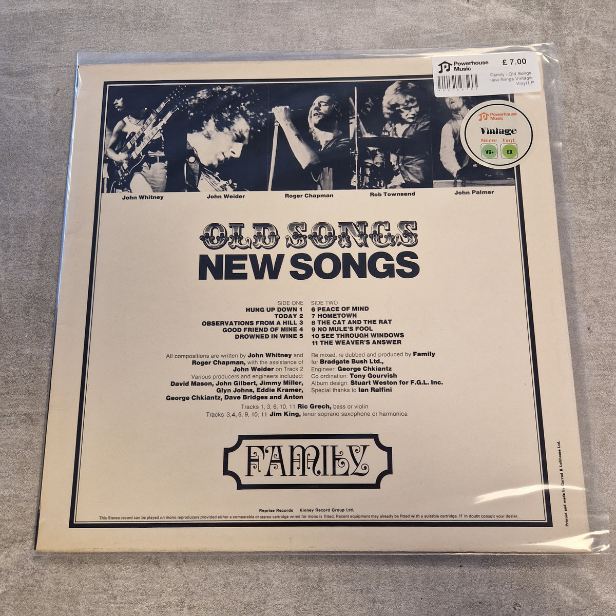 Family - Old Songs New Songs Vintage Vinyl LP A vinyl record sleeve for Family's 'Old Songs New Songs' 12-inch record, sealed in a clear plastic protective sleeve. The back cover features black-and-white band photos at the top, the title in large distressed lettering, a tracklist, and the Family logo at the bottom.