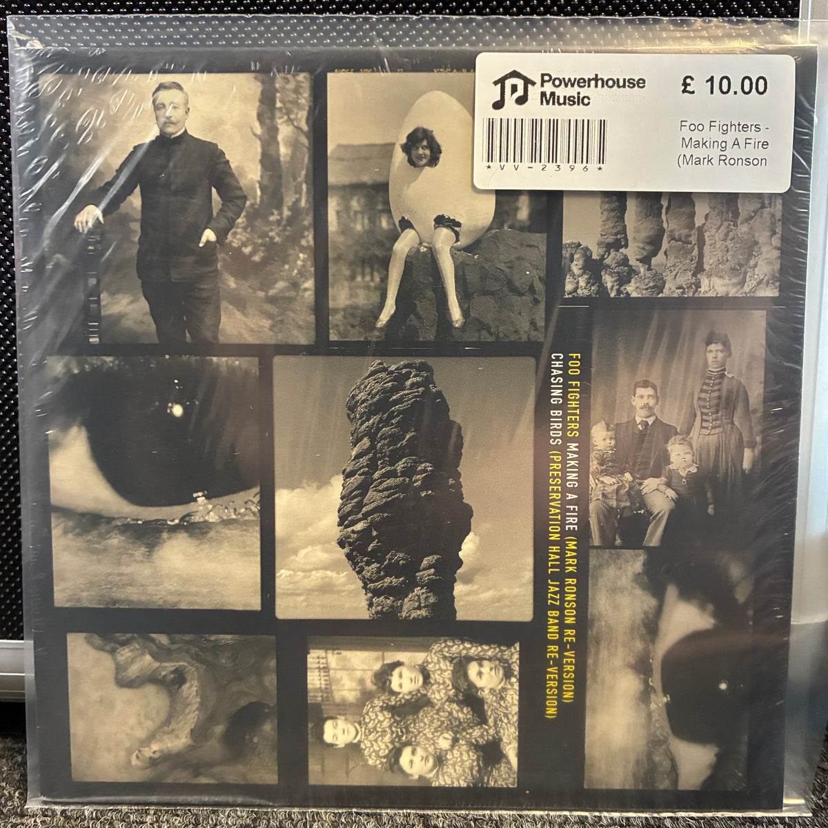 Foo Fighters - Making A Fire (Mark Ronson Re-Version) / Chasing Birds Vintage Vinyl 7" Single The back cover of Foo Fighters' 'Making A Fine' CD album by Mark Ronson, featuring a collage of sepia-toned vintage photographs wrapped in plastic, with a white Powerhouse Music sticker on the top right.