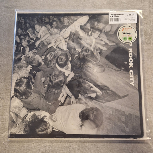 Various - Sub Pop Rock City Vintage Vinyl LP A vinyl record sleeve for the band Rock City, featuring a black and white photograph of a crowd. The sleeve is sealed in its original plastic shrink-wrap with a 'Vintage' seller sticker and a barcode price label in the top right corner.