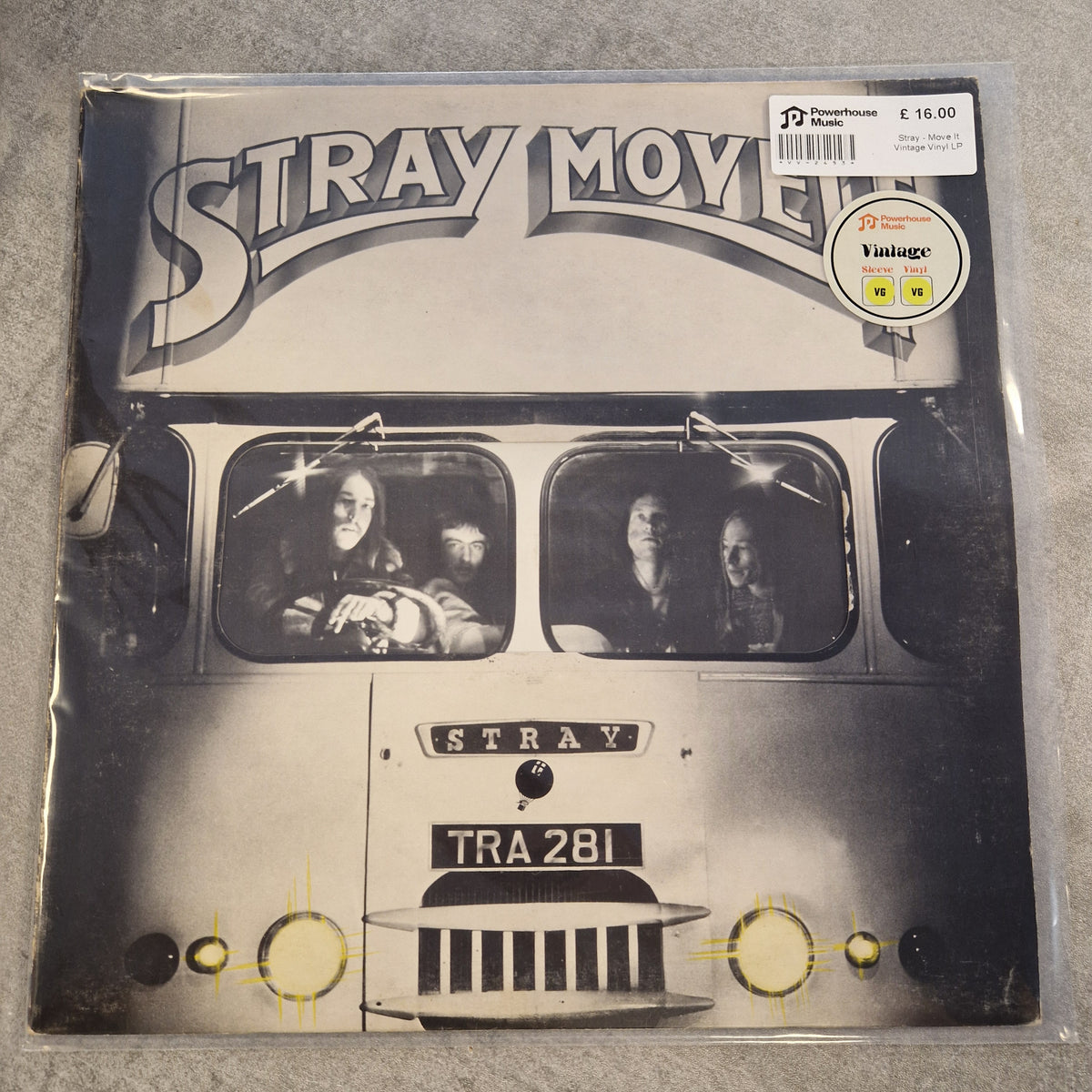 Stray - Move It Vintage Vinyl LP A vinyl record sleeve for the band Stray Mates, featuring a black and white photograph of a van with the band members visible through the windows. The title 'STRAY MATES' is printed in large stylized letters on the left side.