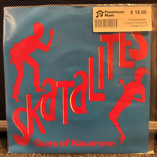 The Skatalites - Guns Of Navarone Vintage Vinyl 7" Single The Skatalites - Guns of Navarone vintage vinyl record sleeve, sealed in plastic with a Powerhouse Music sticker on the top right, set against a dark textured background.