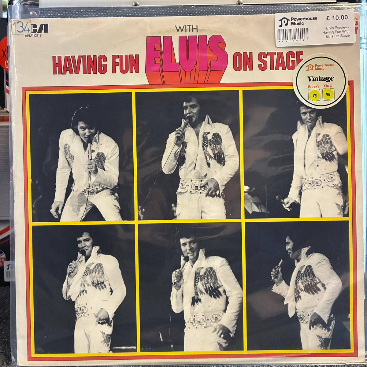 Elvis Presley - Having Fun With Elvis On Stage Vintage Vinyl LP A vintage Elvis Presley vinyl record sleeve titled 'With Elvis Having Fun On Stage,' showing six black-and-white photos of Elvis in white sequined jumpsuits, with red and yellow typography on a cream background.