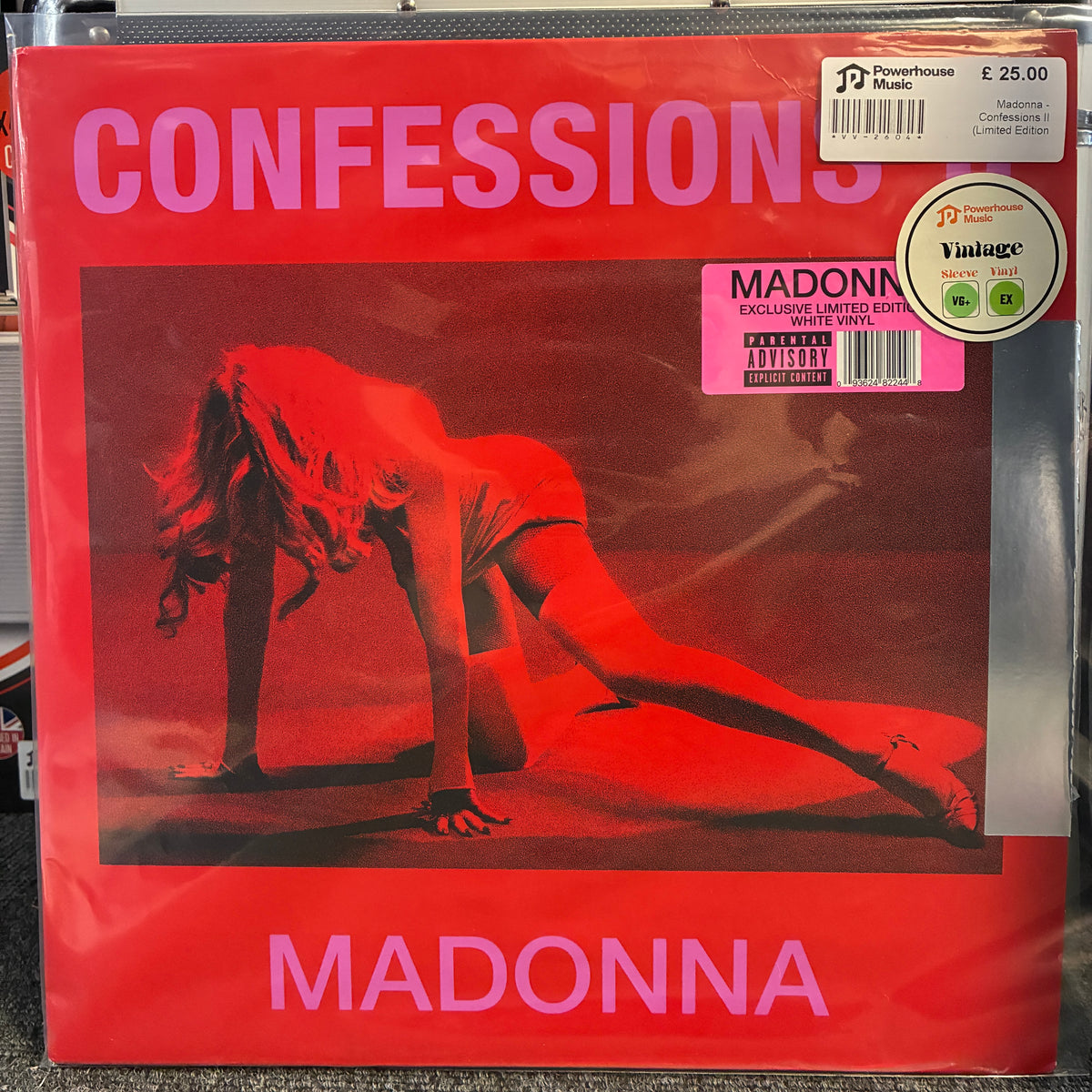 Madonna - Confessions II (Limited Edition White) Vintage Vinyl LP Madonna 'Confessions' vinyl record album cover in red, photographed flat against a dark background. Visible stickers include a JHL Records label sticker and a Yagliu vinyl sticker.