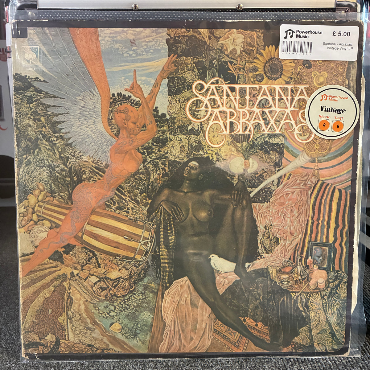 Santana - Abraxas Vintage Vinyl LP A square vinyl record sleeve for Sanlaan Gabaawa, featuring surreal artwork with a winged nude figure, a dark central figure, and striped textiles. A white retailer sticker is visible in the top right corner.