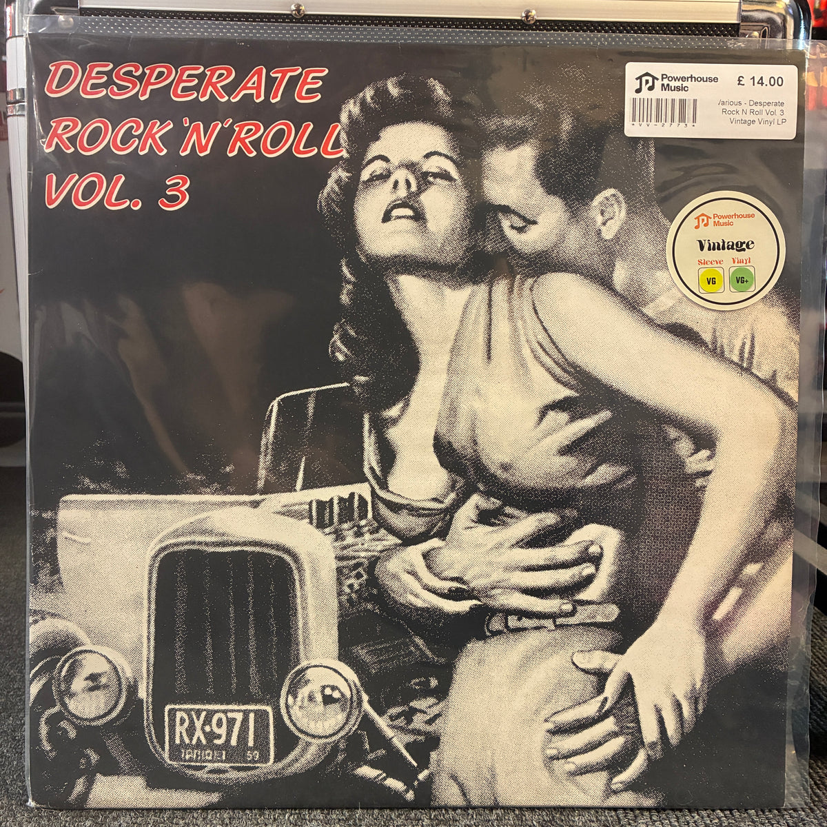 Various - Desperate Rock 'N' Roll Vol. 3 Vintage Vinyl LP Vinyl record sleeve for 'Desperate Rock 'n Roll Vol. 3' with retro illustrated cover art showing a couple and a car, photographed in a binder with a barcode sticker and a Vintage label visible.