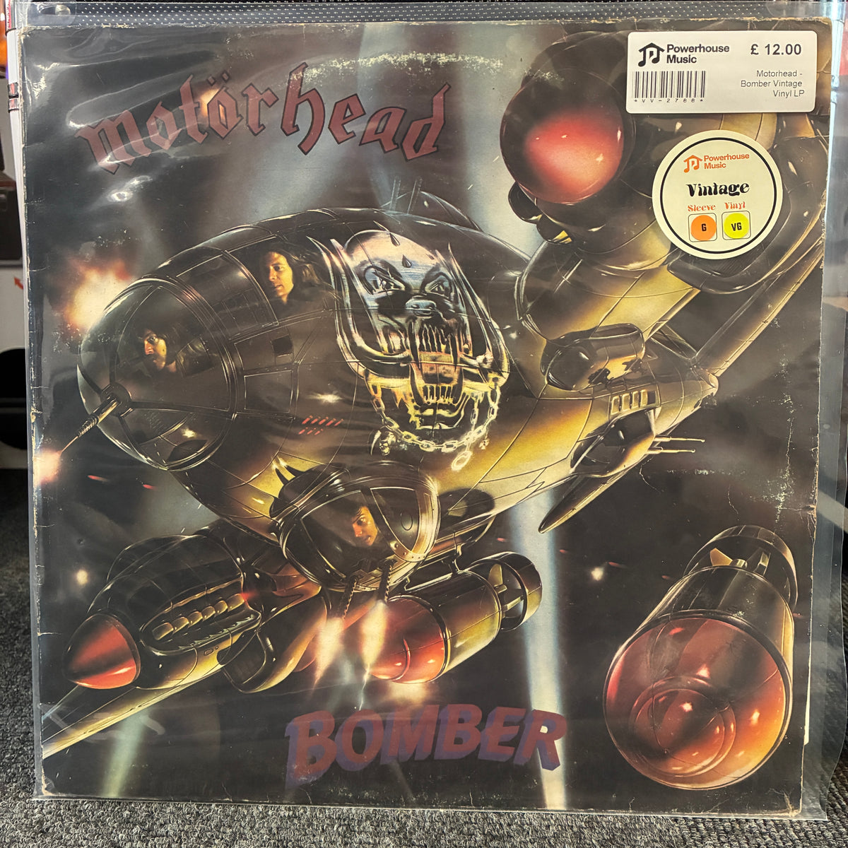 Motorhead - Bomber Vintage Vinyl LP Motorhead 'Bomber' vinyl record cover in its clear plastic shrink wrap, showing the album artwork with a metallic bomber aircraft design and a Powerhouse Music Vintage sticker in the top right corner.