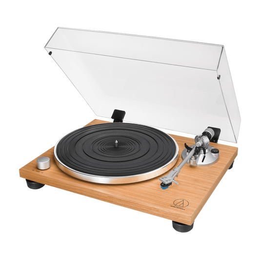 Audio-Technica AT-LPW30TK Turntable with wooden plinth and clear dust cover on a black background