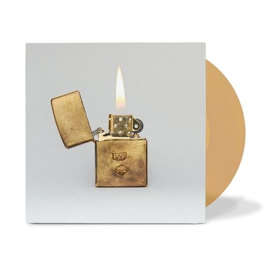 Mumford & Sons Brass zippo lighter with flame on a white background