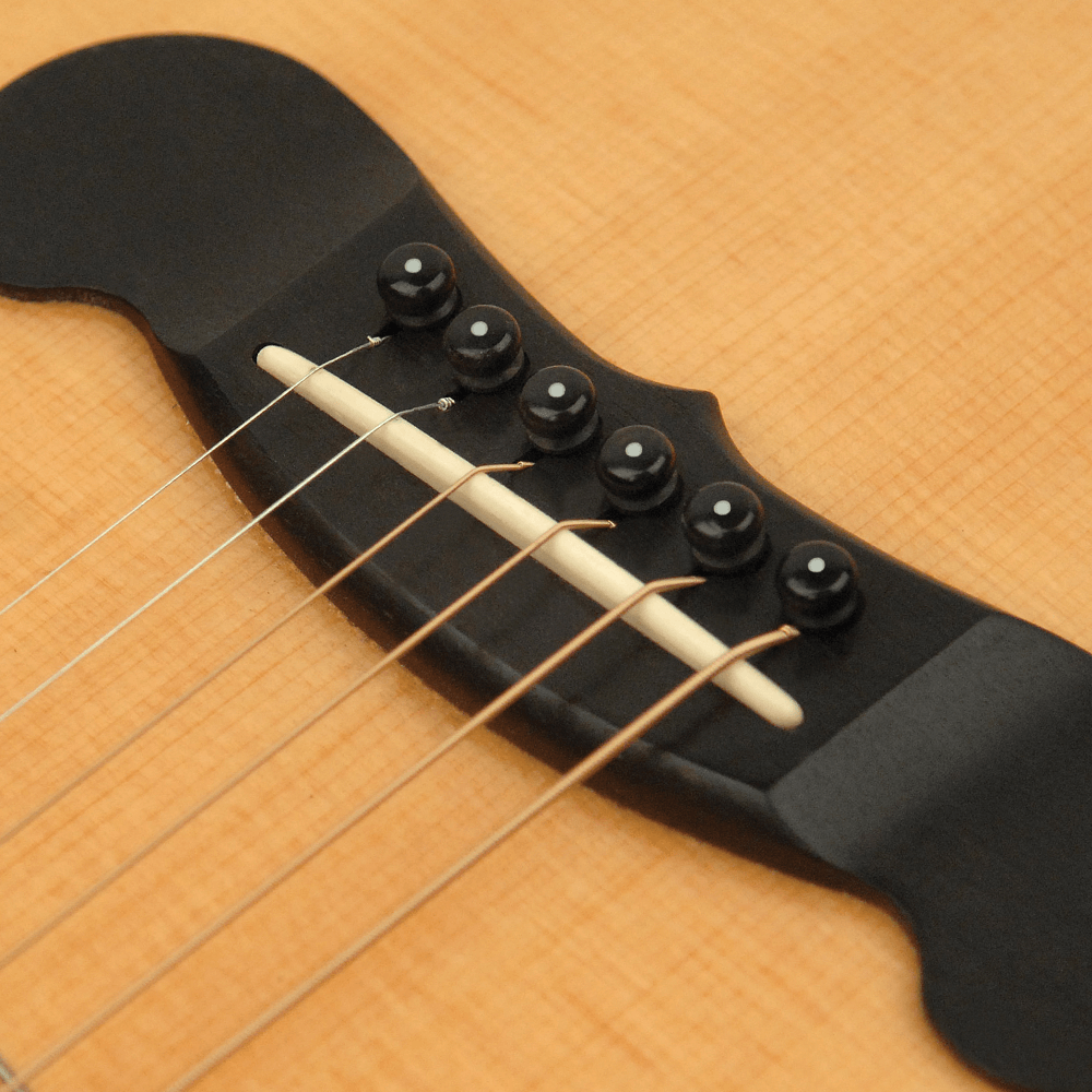 D'Addario Injected Molded Bridge Pins with End Pin Set of 7 - Ebony with Ivory Dot
