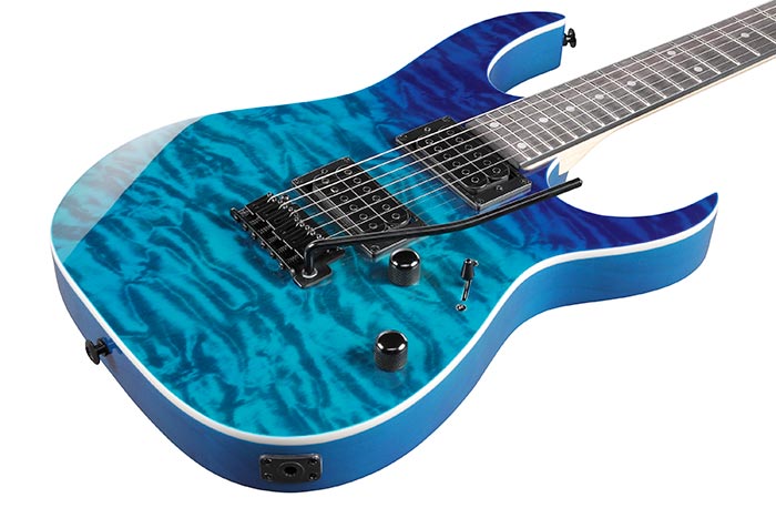 Ibanez GRG120QASP Blue electric guitar with a wavy pattern on a white background