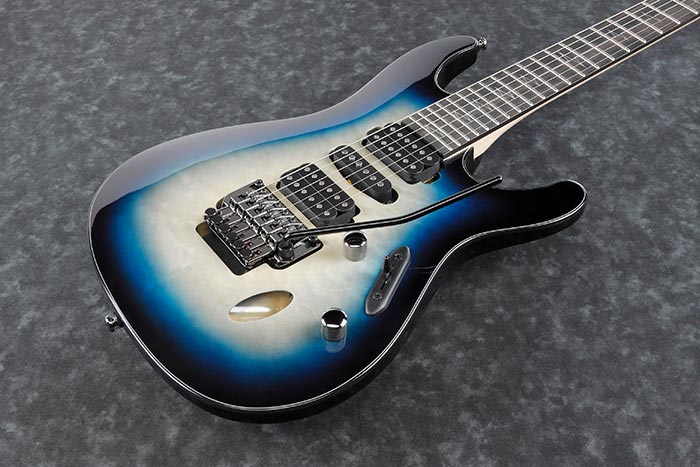 Ibanez JIVAJR-DSE Electric guitar with a blue and white gradient on a gray textured background