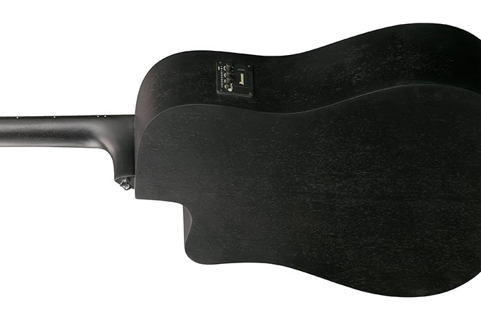 Close-up of a black Ibanez V44CE-WK acoustic guitar body with a visible brand logo on a white background