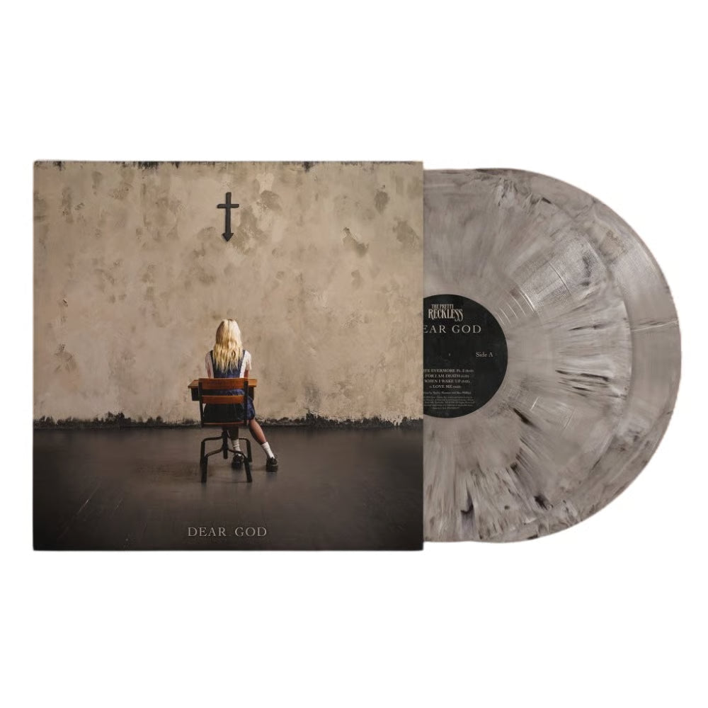The Pretty Reckless - Dear God Vinyl record with cover showing a person sitting on a chair in front of a wall with a cross, titled 'Dear God'.