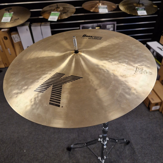 Pre-Owned Zildjian Cymbal on a stand with 'Dark Crash' branding in a store setting