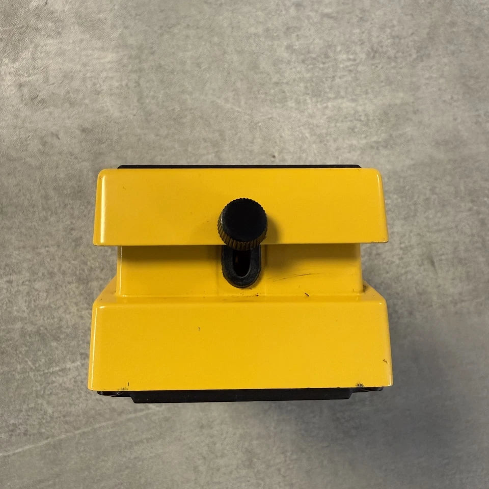 Pre-Owned Boss OD-1 Yellow metal step platform on a gray concrete floor