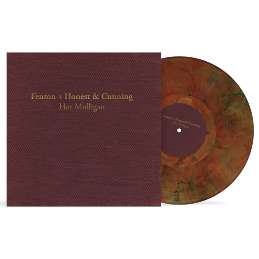 Vinyl record with maroon cover and multicolored disc on a white background